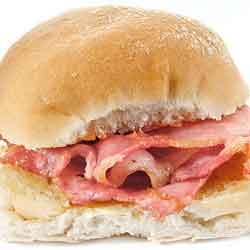 grilled bacon in a bread roll