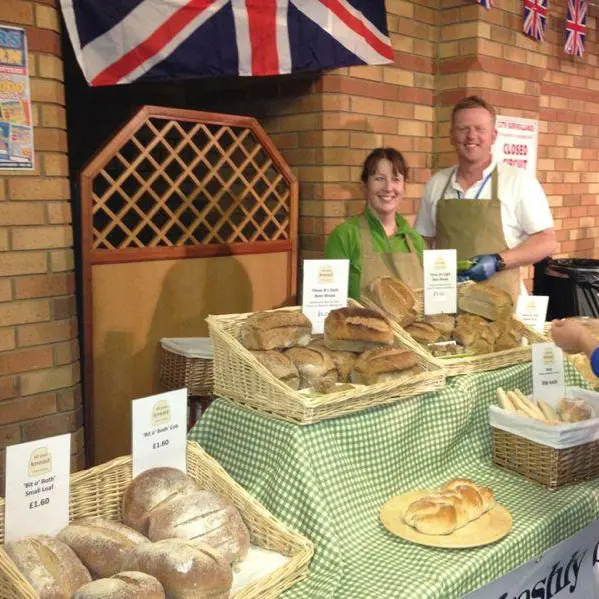 Craig and Julie Dugan, founders and owners of Lancashire's All You Knead bakery. THey're pictured behind the counter of one of their very first food festivals.